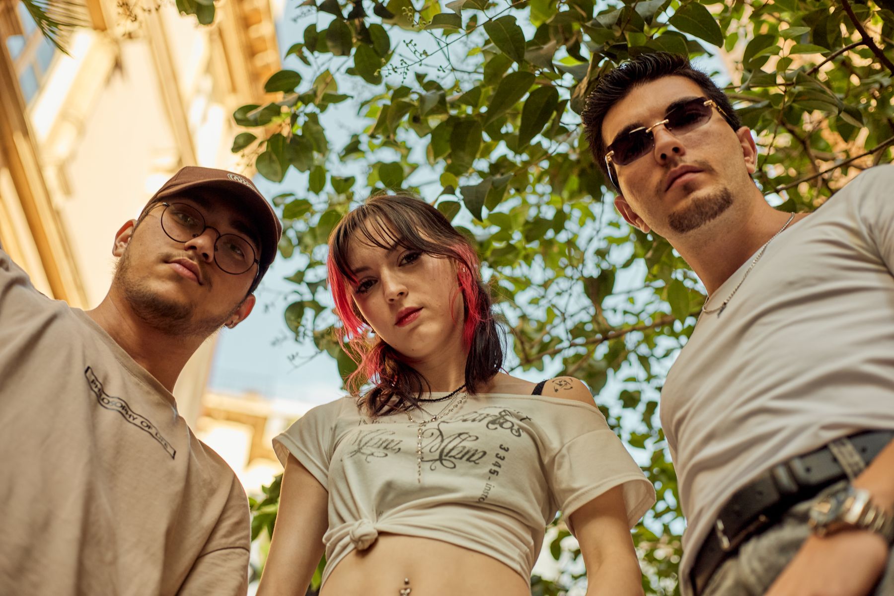 Mixed group of friends photographed from a low angle